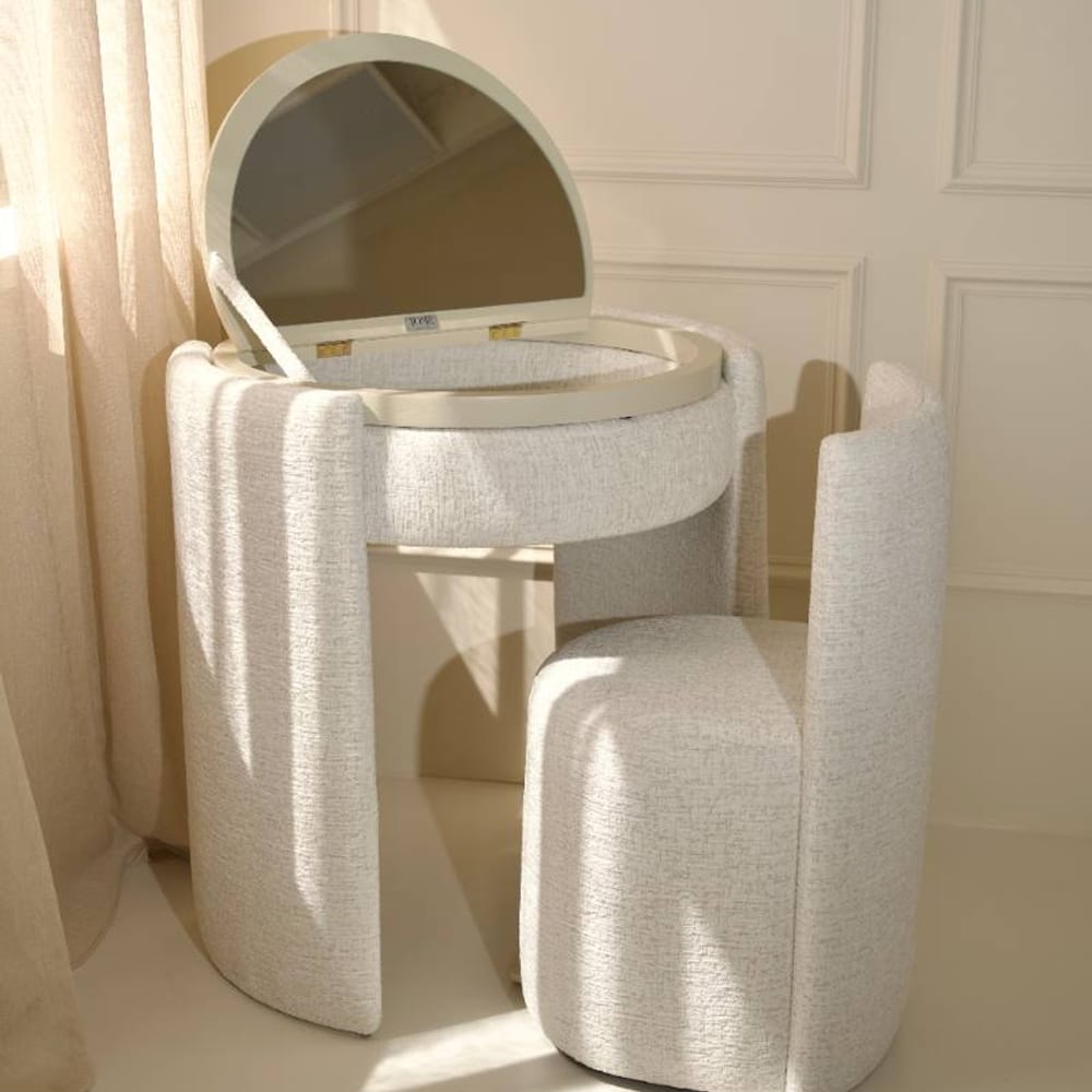 Open — the mirror stands up with the lid
