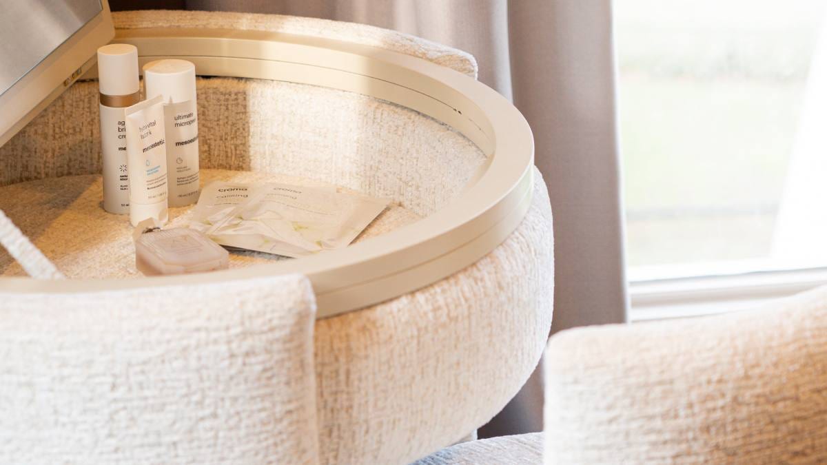 Hidden storage well filled with beauty products